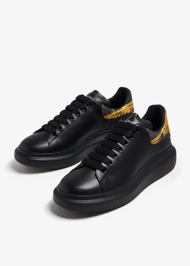 ALEXANDER MCQUEEN EN NEGRO Y DORANDO