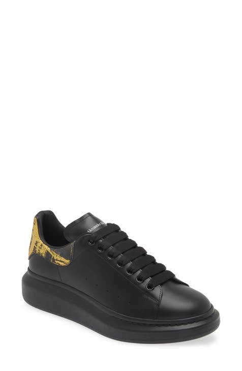 ALEXANDER MCQUEEN EN NEGRO Y DORANDO