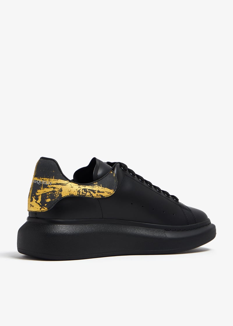 ALEXANDER MCQUEEN EN NEGRO Y DORANDO